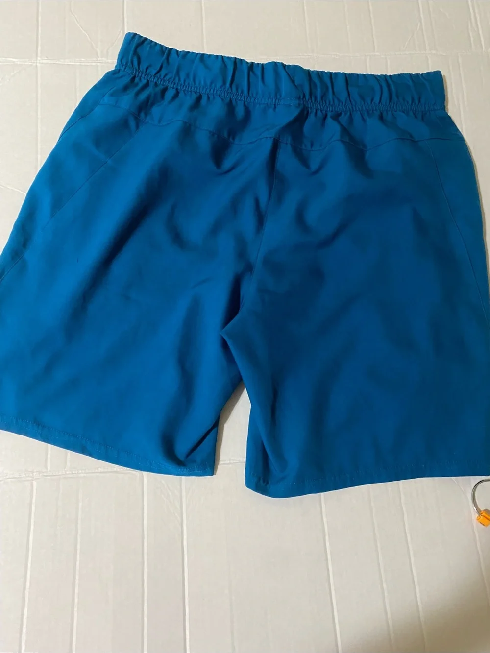 Nike Men's Bright Teal Athletic Shorts with White Swoosh